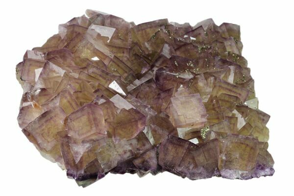 Cubic fluorite crystals from the Yaogangxian Mine in China with multiple phantoms clearly visible in the crystals.